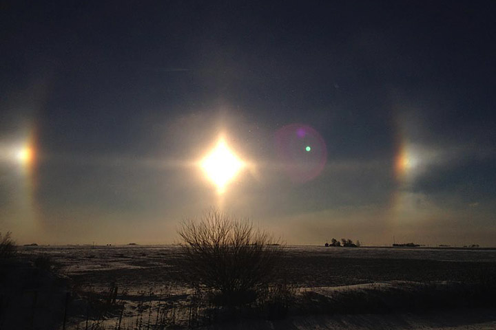 sundog_jones An image of a sundog, one of the most common types of ice halos. https://earthobservatory.nasa.gov/blogs/earthmatters/2014/02/03/reader-pics-sundogs/ Image Credit: Adam Voiland