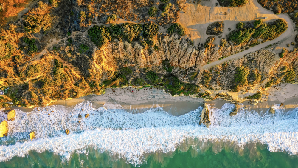 https://www.magnific.com/free-photo/beautiful-aerial-photography-shoreline-sea-with-amazing-waves-sunny-day_7955728.htm#fromView=search&page=1&position=16&uuid=88b9d93a-606a-4b9f-80c0-c988f26f2cc4&query=California+coast" Image by wirestock on Magnific.com